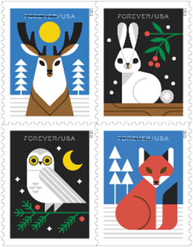 I quattro francobolli americani con gli animali del bosco d'inverno: cervo, coniglio, gufo e volpe