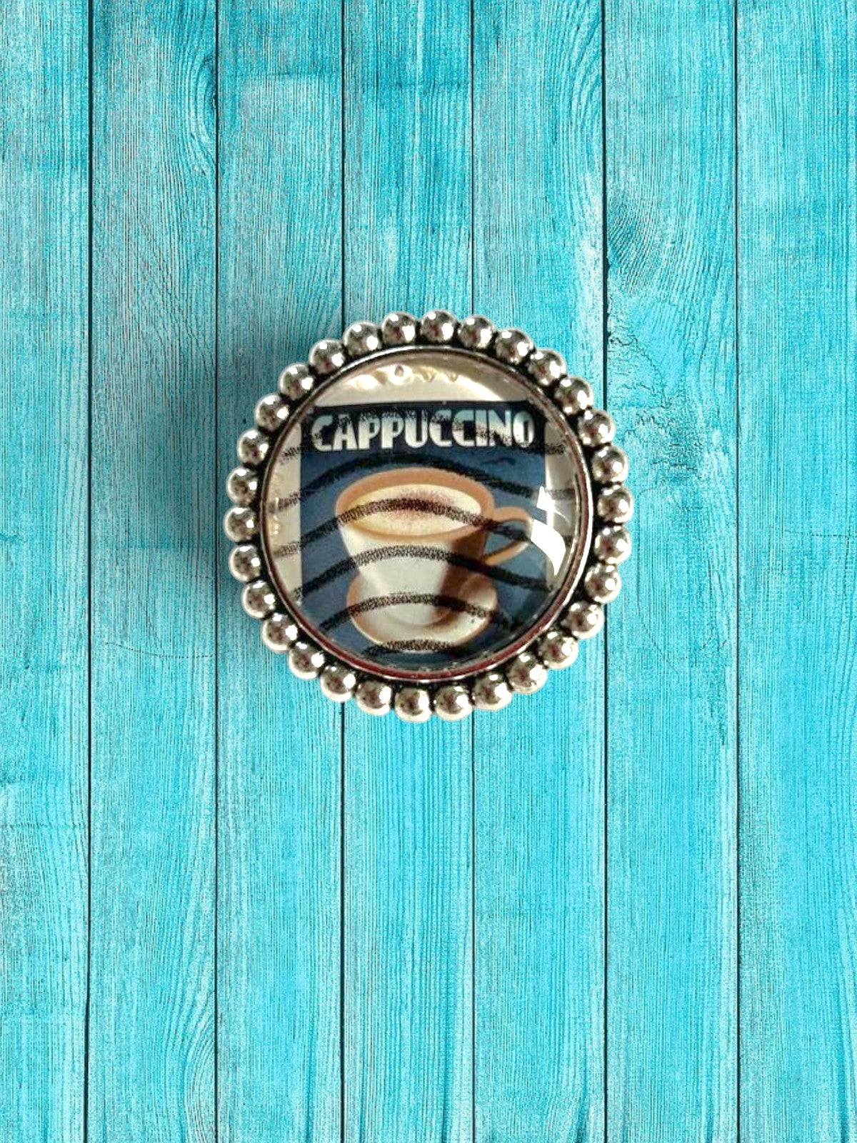 Spilla cappuccino con francobollo americano